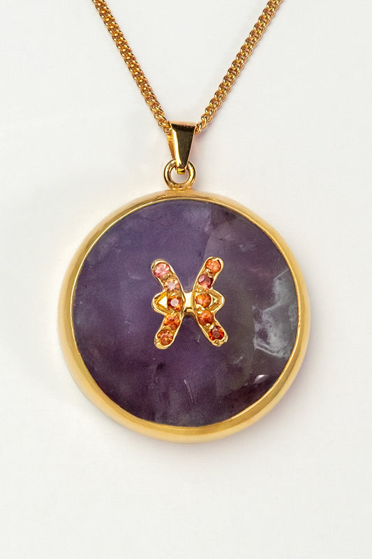 Pisces zodiac pendant: Amethyst cabochon and 14K Gold Vermeil.
Amuleto de Piscis Amatista cabujón y 14K Gold Vermeil.