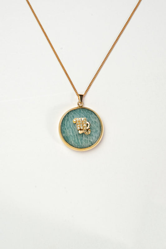 Virgo zodiac pendant: amazonite cabochon and peridot.

Amuleto de Virgo: amazonita cabujón y peridoto.